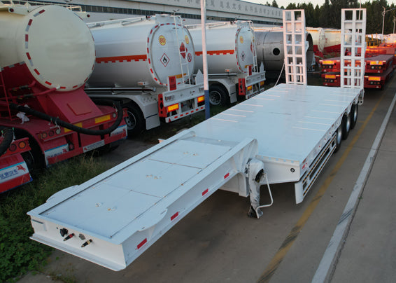 Heavy duty low flatbed transport semi-trailer