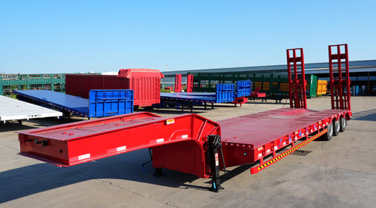 Heavy duty low flatbed transport semi-trailer