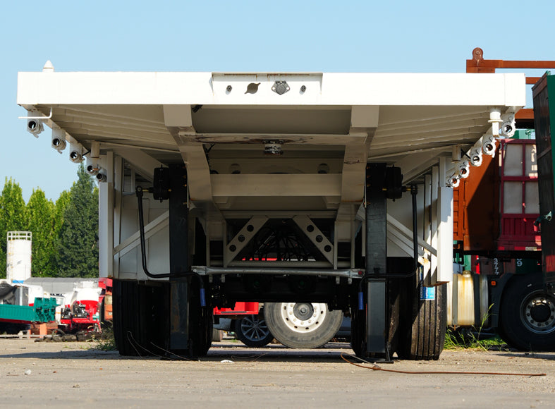 Heavy duty flatbed transport semi-trailer