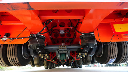 Heavy duty low flatbed transport semi-trailer